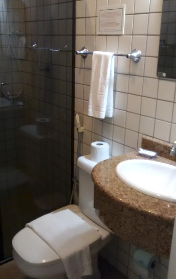 Holambra Garden Hotel Экстерьер фото A shower in a hotel bathroom
